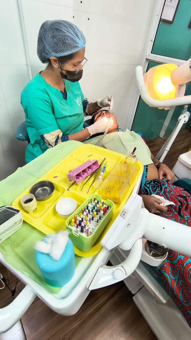 Dentist Checking Patient Your V Care Vasai 768x1365
